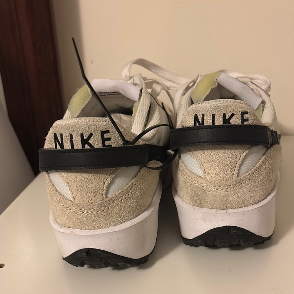 Nike White and Black Athletic Shoes with Textured Upper
